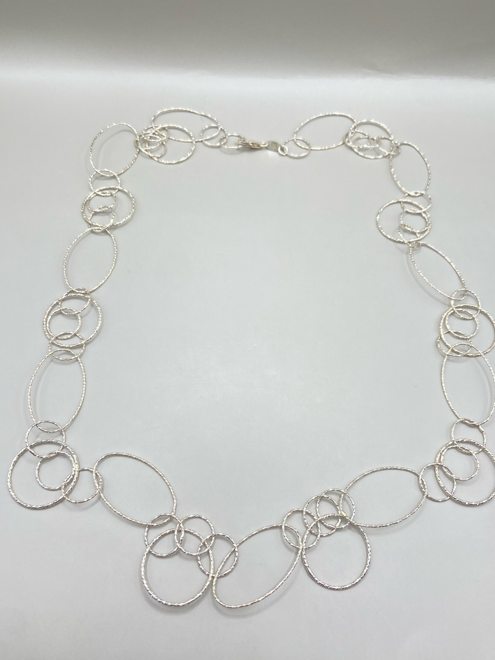 Dyadema Sterling silver Interlocking Textured Circle Necklace